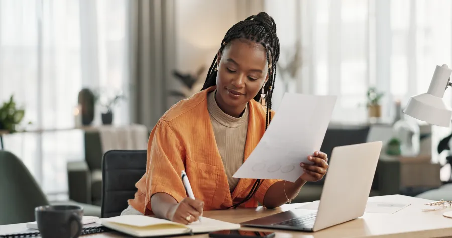 a person holding a piece of paper