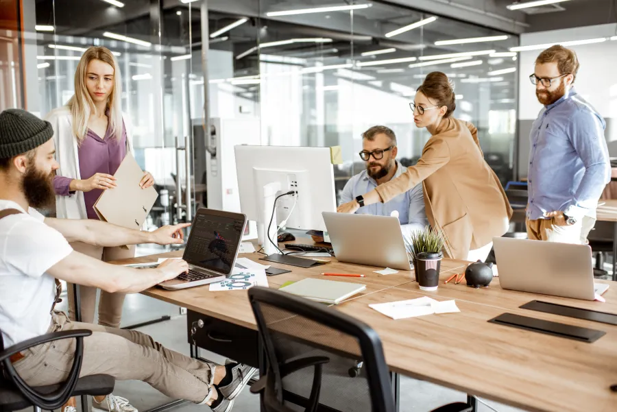 a group of people in an office
