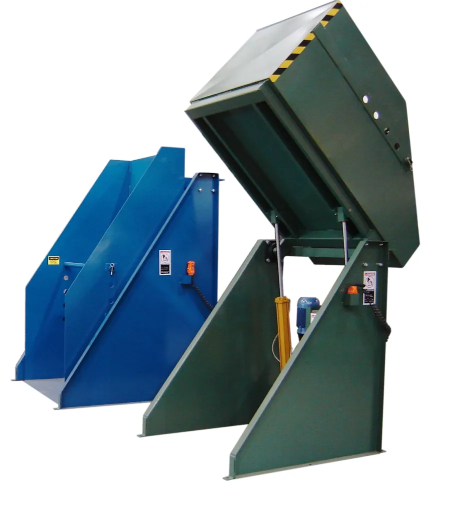 Industrial container dumper with green and blue units for lifting and emptying heavy bins in factories.