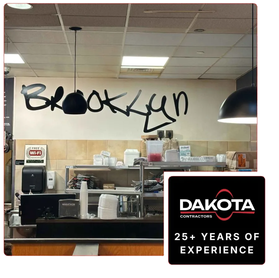 Interior of a Brooklyn eatery showing black pendant lights, shelving with supplies, and a Wi-Fi sign.
