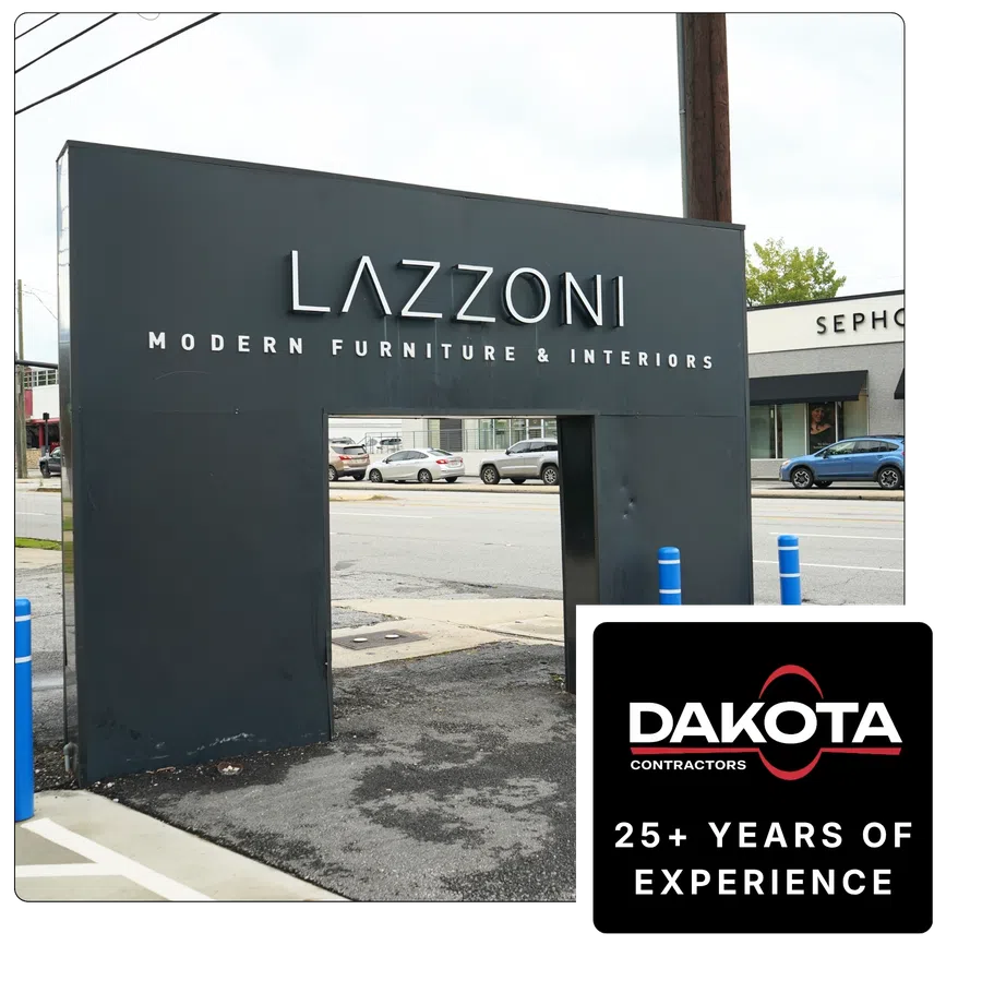 Outdoor sign for Lazzoni modern furniture and interiors store with street and cars in background