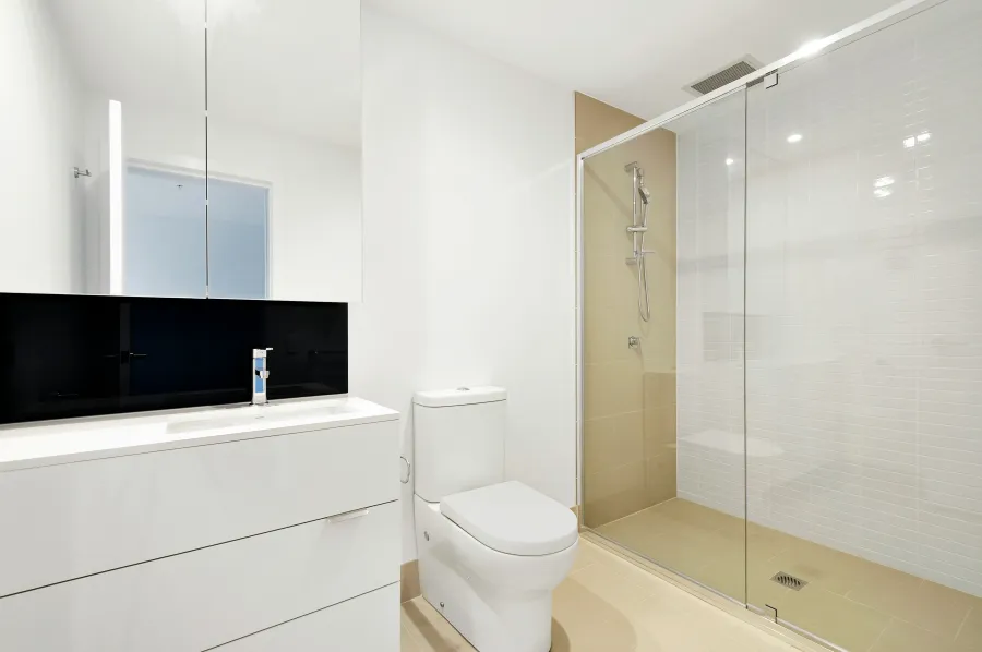 a bathroom with a glass shower