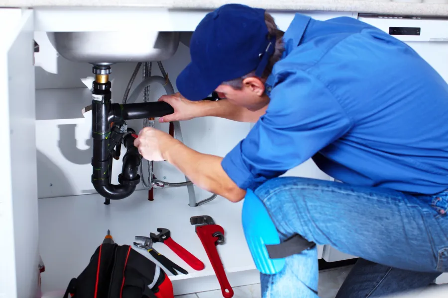 a man fixing a machine