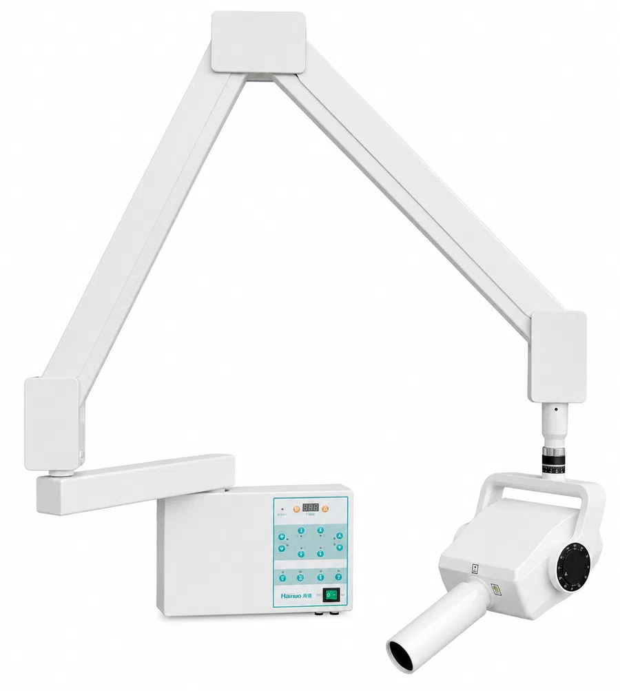 White dental X-ray machine with adjustable arm and control panel for imaging in dental clinics.