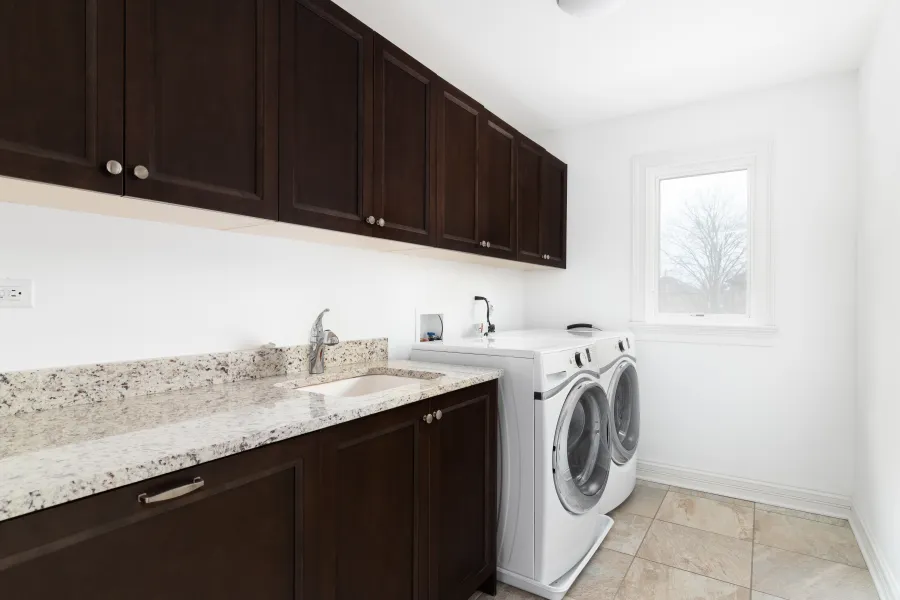 a washer and dryer in laundry room