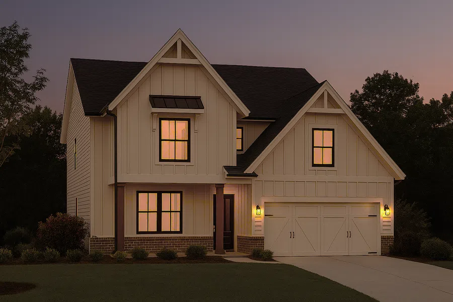 Two-story modern farmhouse with illuminated windows, white siding, and a double garage at dusk.