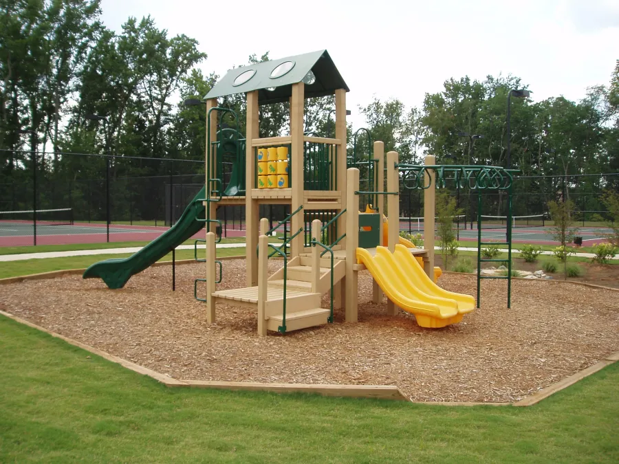 a small play structure in a park