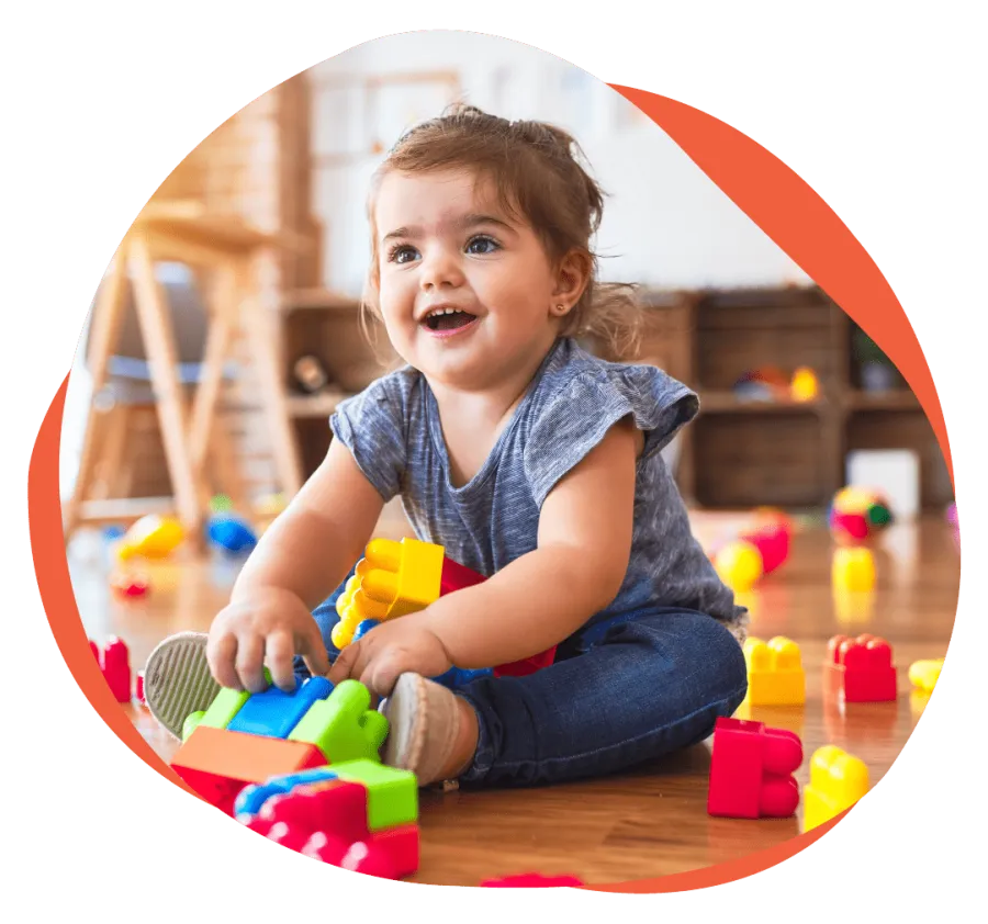 a baby playing with toys