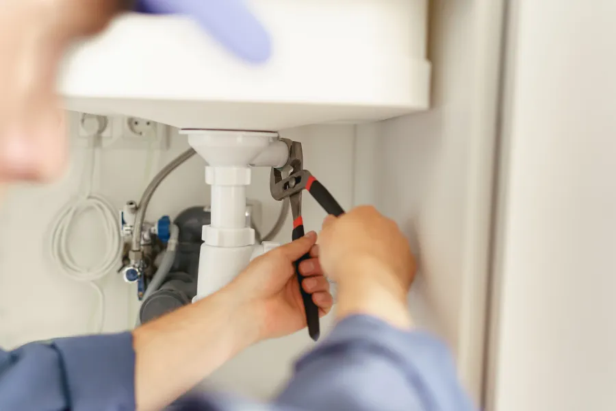 a person using a microscope