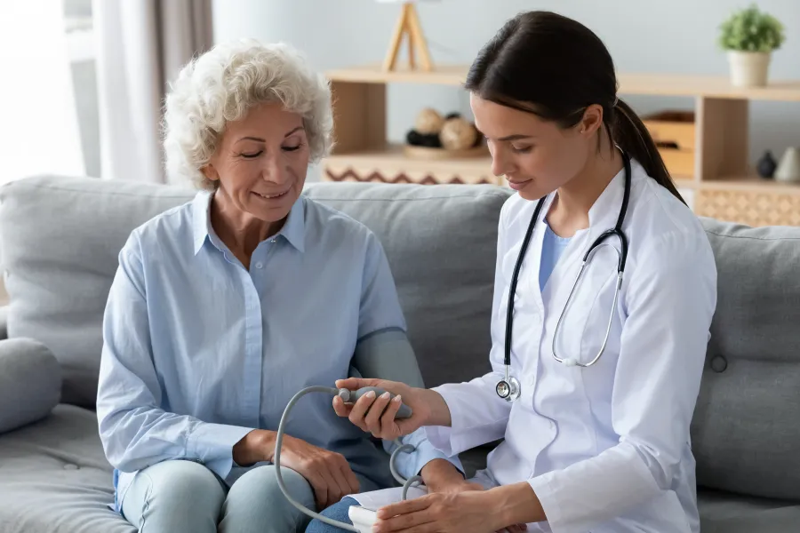 a doctor showing a patient something on the phone