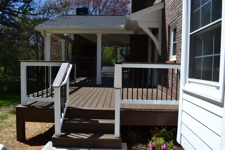 a deck with a porch and a gazebo