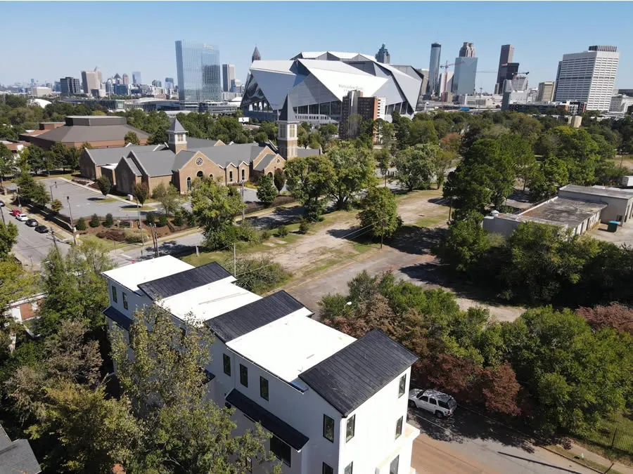 a group of buildings and trees