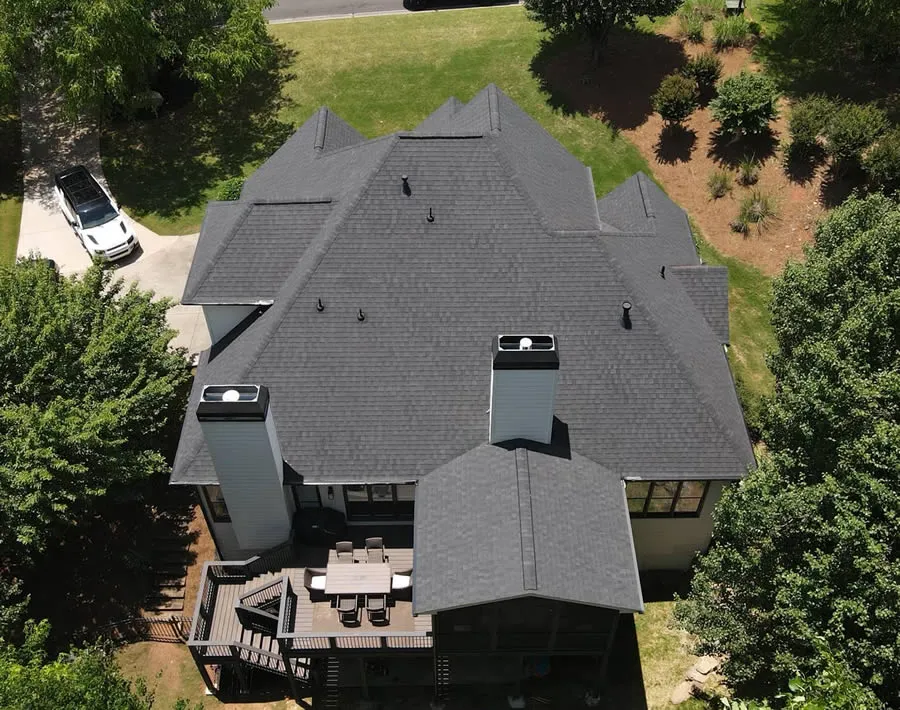 a house with a car parked in the driveway