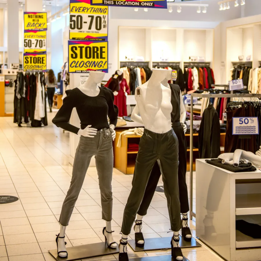 a pair of mannequins in a store