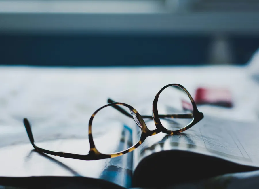 a pair of glasses on a table