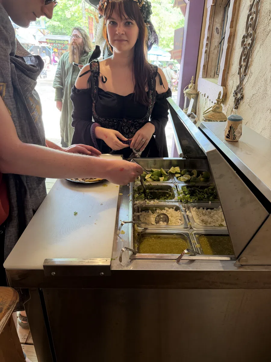 The self-serve salsa bar at The Royal Taqueria — limes, cilantro, onion and salsas