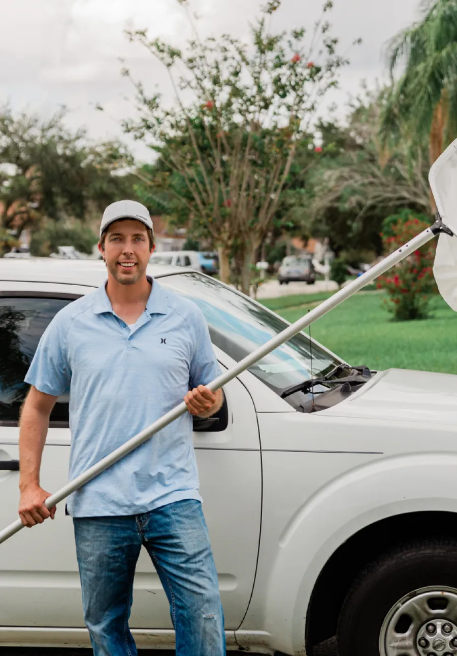 a man holding a fishing rod