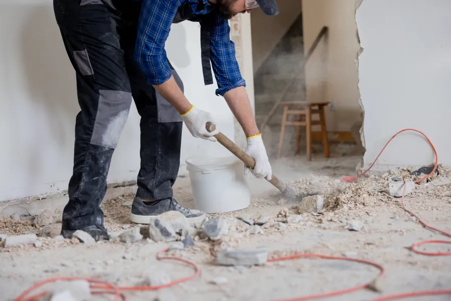 a few people working on a floor