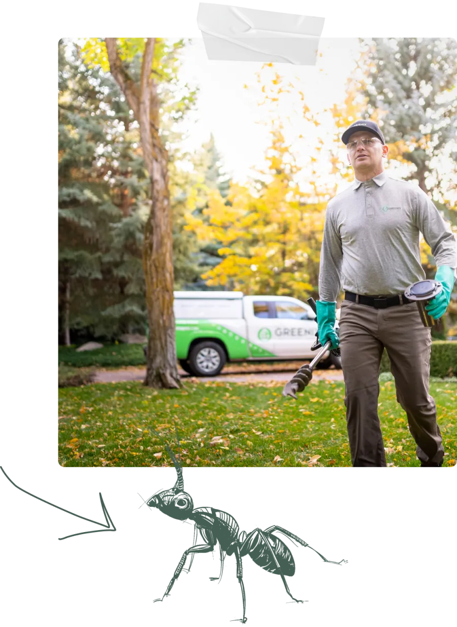 Pest Technician walking to house with tools