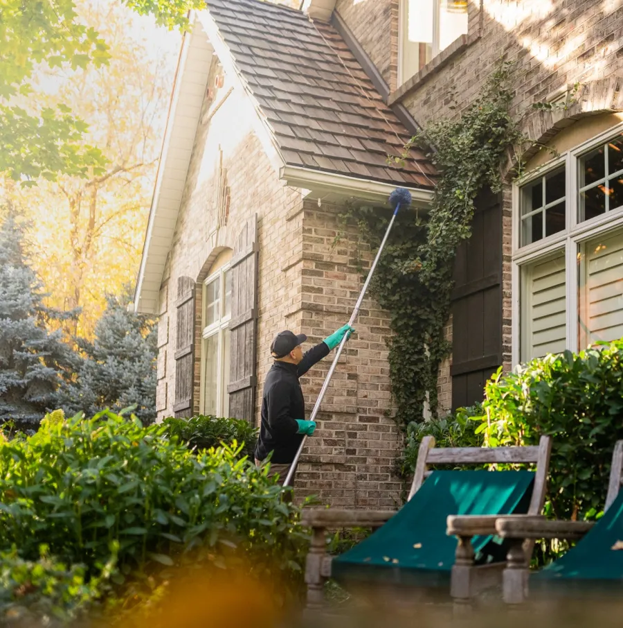 a person on a swing in a flooded yard