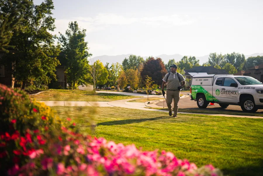 Service technician approaching a customers home to service for German Cockroaches.