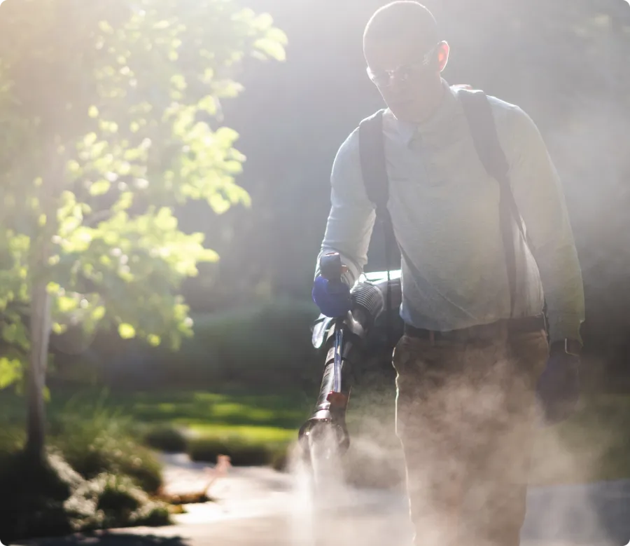 Pest Technician fogging for mosquitos