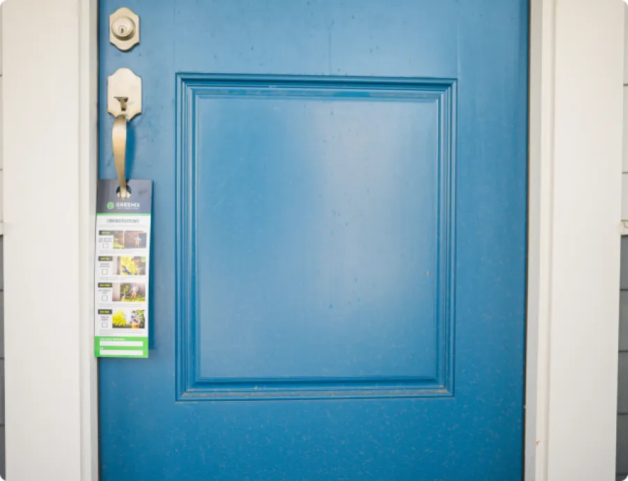 a blue door with a greenix care sheet