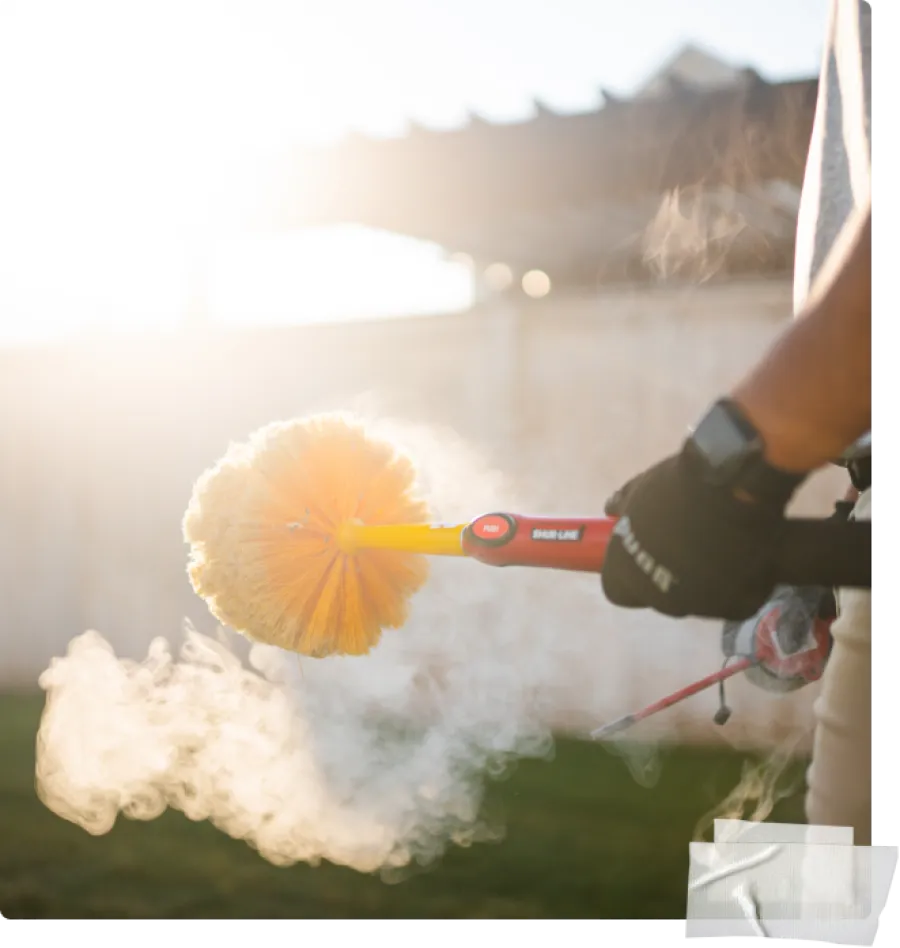 a person spraying a substance