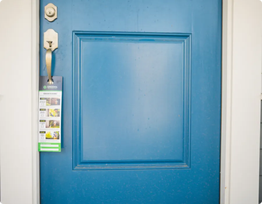 a blue door with a sign on it