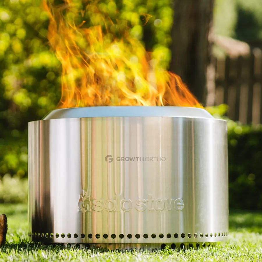 a white cylindrical container with a flame