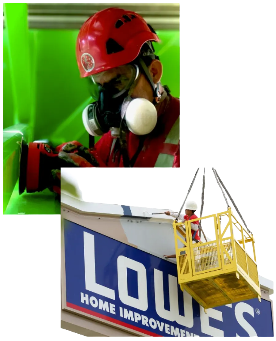 Construction worker wearing red helmet and respirator sanding and painter in lift updating Lowe's store sign.