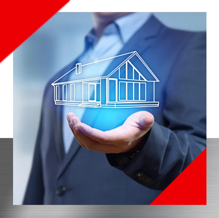 Businessman holding a glowing digital house model symbolizing real estate investment and property management.