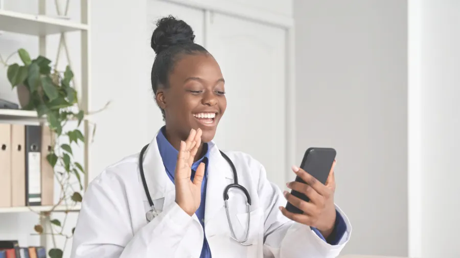 a doctor using a phone