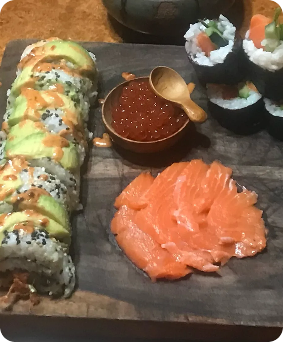 a group of sushi rolls