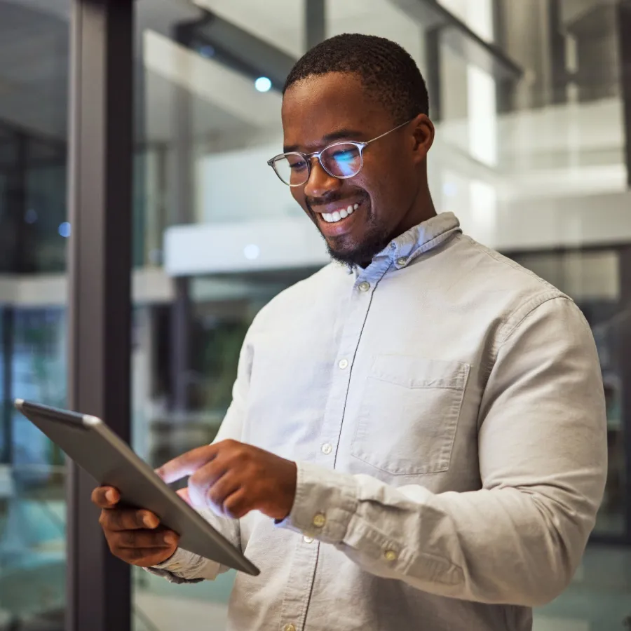 a man holding a tablet