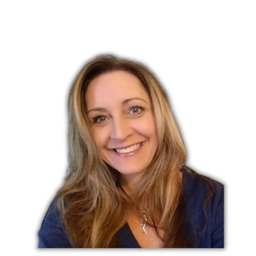 Smiling woman with long blonde hair wearing a blue top and a cross necklace against a black background
