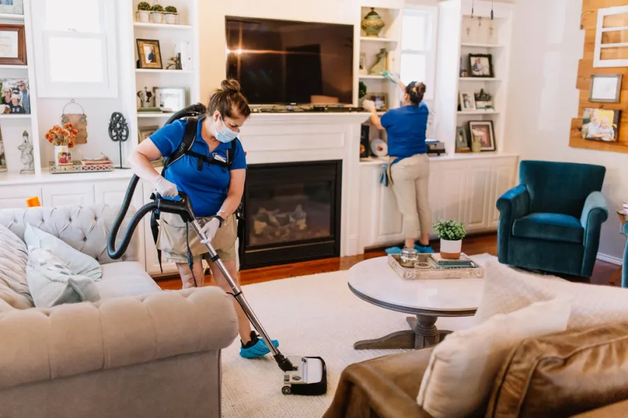 Maid Brigade cleaning a living room