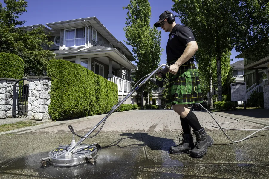 a man holding a hose