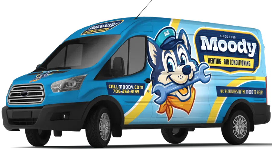 Blue Moody HVAC service van with dog mascot holding a wrench and contact information displayed