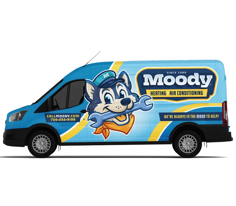 Blue Moody Heating and Air Conditioning service van with dog mascot holding wrench and contact info