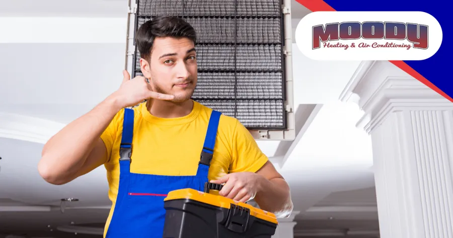 a person holding a yellow tool