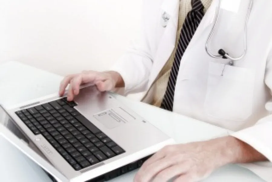 a doctor using a tablet