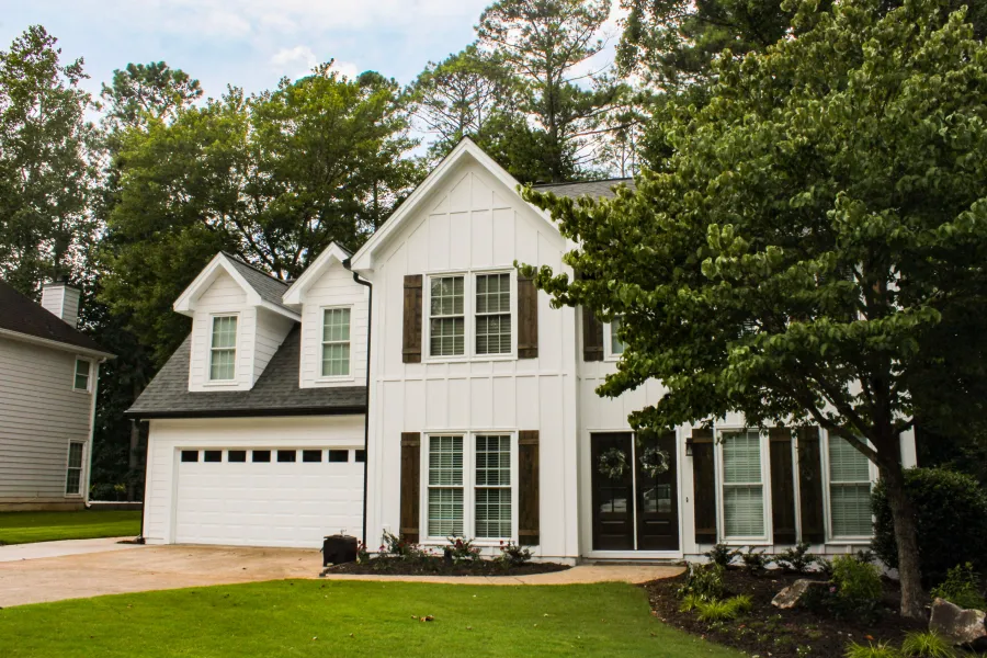 a white house with a garage