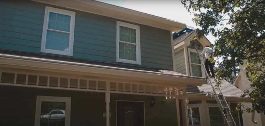 a house with green siding in Marietta, GA