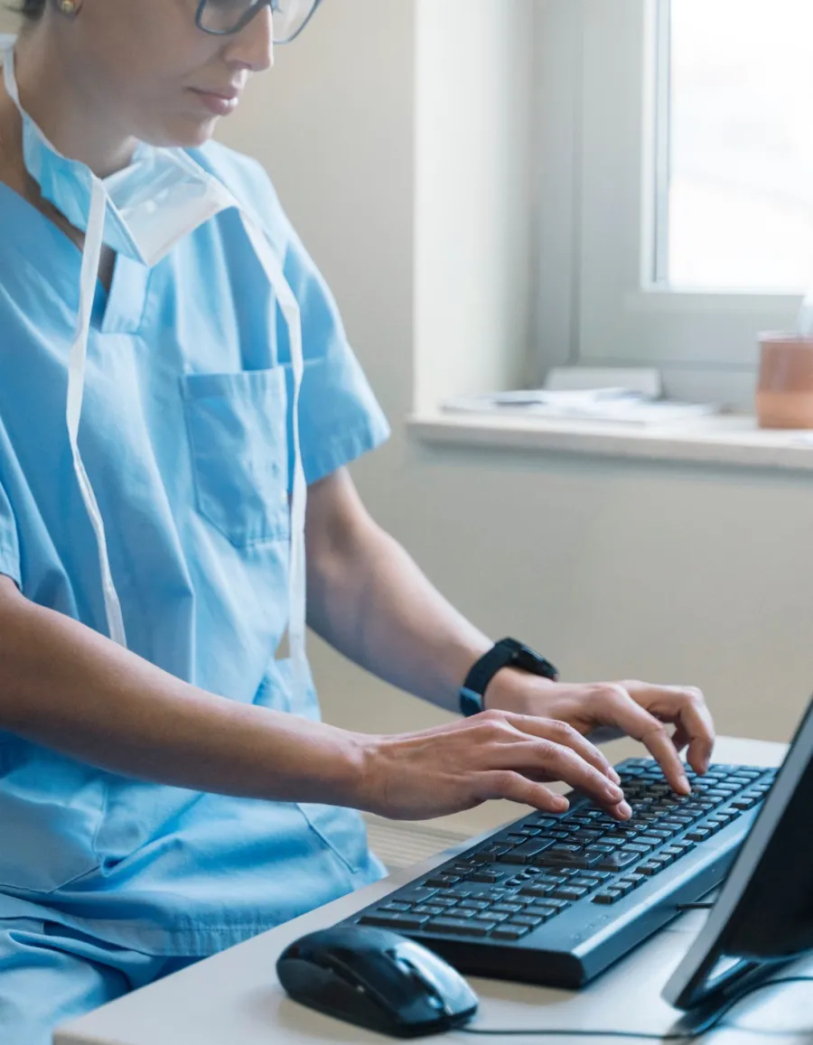 a doctor using a computer