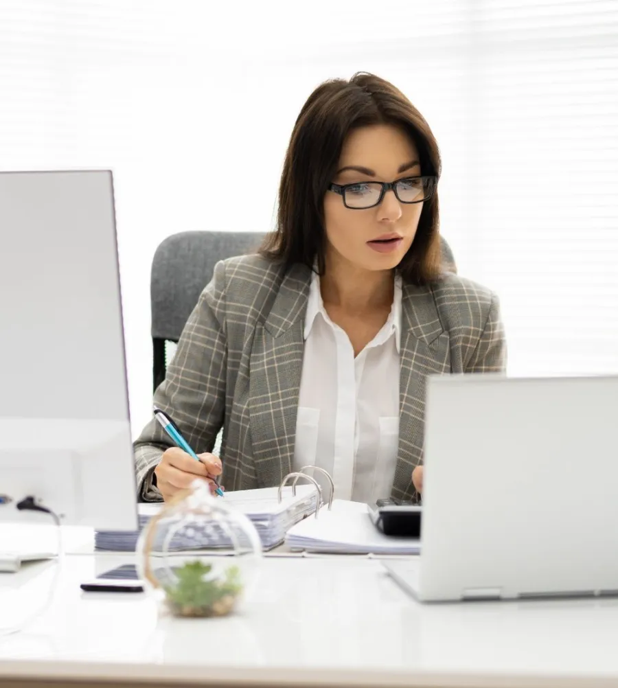 a woman sitting at a desk