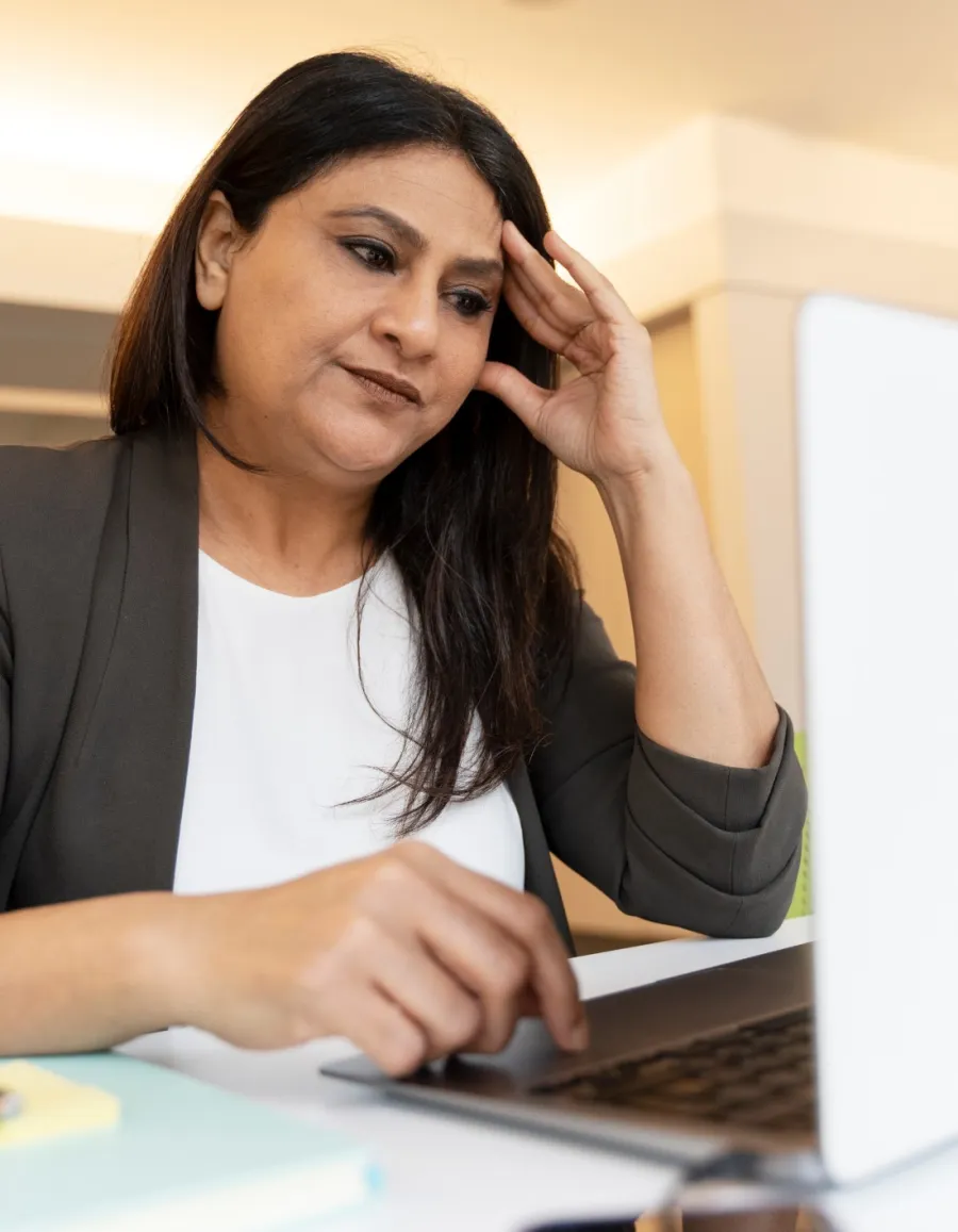 a woman sitting at a desk