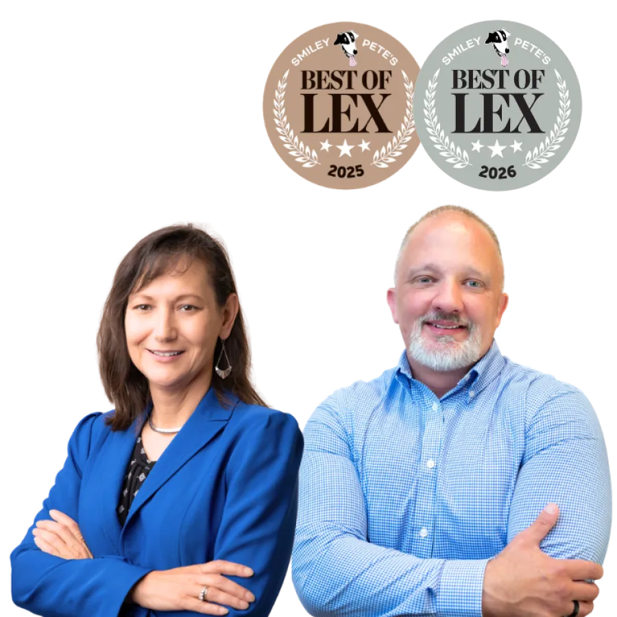 Professional man and woman with arms crossed under 2025 and 2026 Best of Lex awards from Smiley Pete's