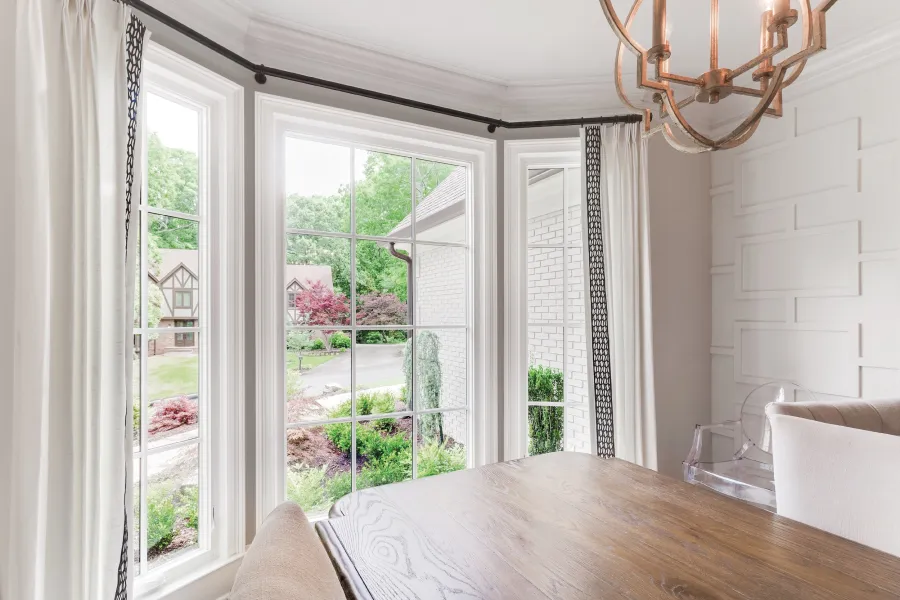 a room with a table and chairs