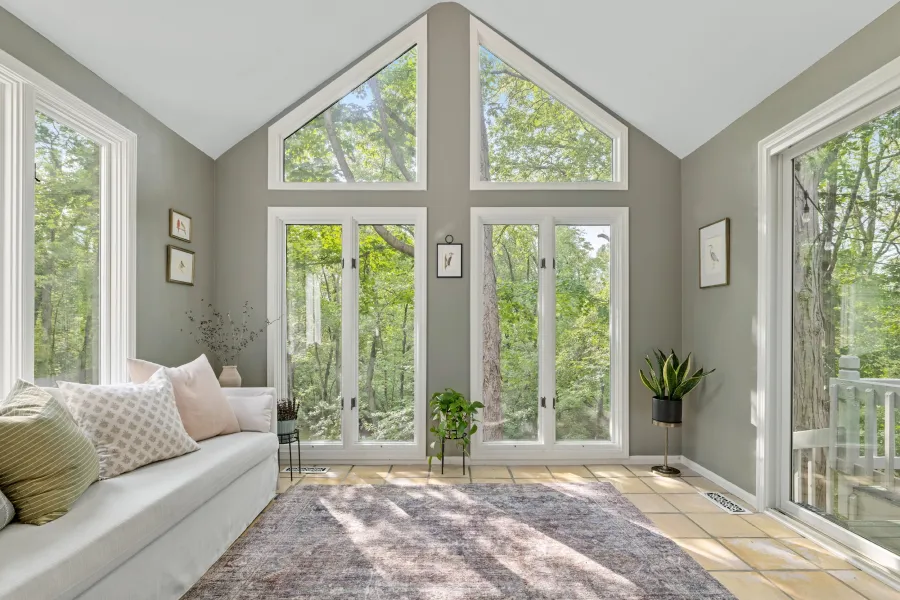 a living room with a large glass door